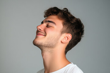 Fototapeta premium A close up of a man's face with his eyes closed