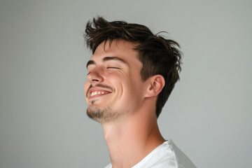 Obraz premium A close up of a man's face with his eyes closed