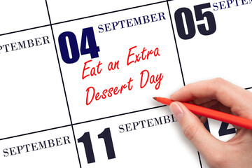 September 4. Hand writing text Eat an Extra Dessert Day on calendar date. Save the date.