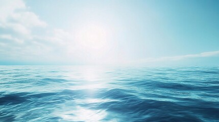 Obraz premium Ocean Sunrise Serenity: Tranquil blue ocean waves bask under a golden sunrise, offering a serene and vast seascape for peace and tranquility. 