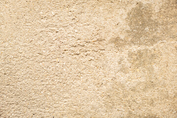 Textured Beige Concrete Surface with Subtle Cracks for Backgrounds and Design Projects