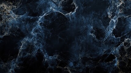 Obraz premium A dark, textured background with swirling patterns and hints of light.
