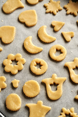 Raw Linzer Christmas cookies before baking on a baking sheet