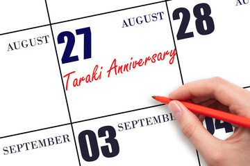 August 27. Hand writing text Taraki Anniversary on calendar date. Save the date.