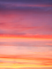 Sunset colors blend to create a romantic atmosphere; ideal for love themes.