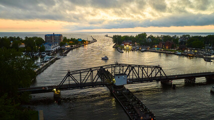 Aerial View of Benton Harbor at Sunset with Iron Bridge and Lighthouse