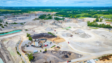 Aerial of Quarry and Mining Operation with Heavy Machinery