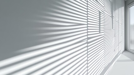 Obraz premium A minimalist interior with shadows cast by blinds on a white wall.