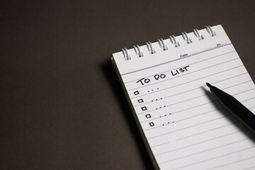 small notebook with black background, office and education concept