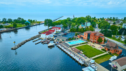 Aerial View of Lakeside Community with Marina and Lighthouse