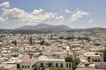 Obraz premium The buildings of the town of Rethymno on the island of Crete as seen from the Venetian fortress