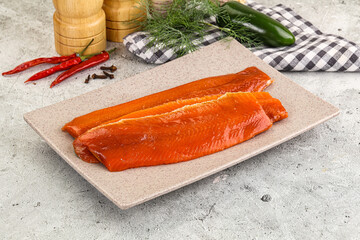 Red pickled herring fish fillet