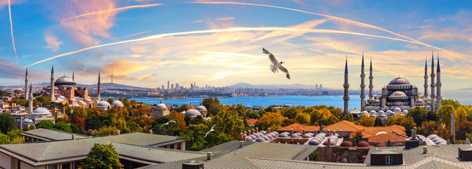Beautiful sunset over the Istanbul roofs near Hagia Sophia and the Blue Mosque, Turkey