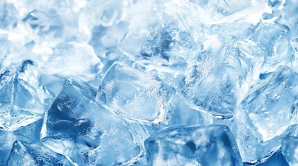 Obraz premium Close-up of crystal clear ice cubes, glistening in shades of blue, creating a refreshing and cool atmosphere.