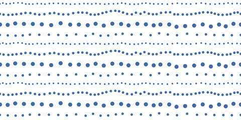 Rows of dots, pattern of small blue circles. White background.