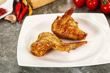 Tasty roasted chicken wing with spices