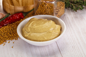 Dijon mustard sauce in the bowl