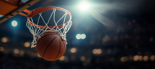 A dynamic basketball scene capturing the precise moment a basketball nears the hoop in an energetic indoor court setting.