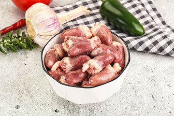 Fresh raw chicken hearts in the bowl