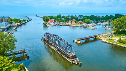 Obraz premium Aerial View of Waterfront Drawbridge and Marina in Benton Harbor