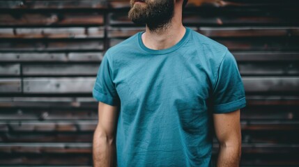Obraz premium A person with a beard and a blue shirt, possibly for casual or outdoor activities