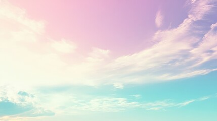 Obraz premium A serene sky blending pastel colors of pink and blue with soft clouds.