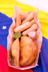 Typical Venezuelan food, tequeños et empanandas, traditional Venezuelan guasacaca sauce