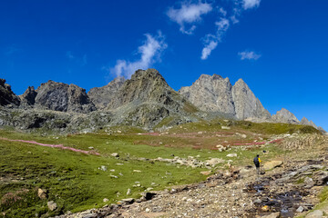 Beautiful mountain scenery. River, valley, snow, blue sky, white clouds. In-depth trip on the Sonamarg Hill Trek in Jammu and Kashmir, India