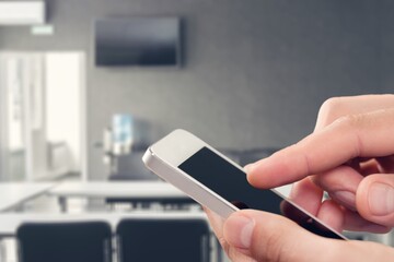 Business person hands hold phone