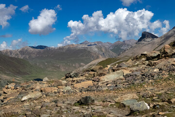 Beautiful mountain scenery. River, valley, snow, blue sky, white clouds. In-depth trip on the Sonamarg Hill Trek in Jammu and Kashmir, India