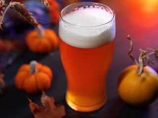 Pumpkin beer ale on the table, close-up. Celebrate Thanksgiving