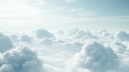 Fototapeta premium A serene view of fluffy clouds in a bright sky, evoking tranquility and openness.