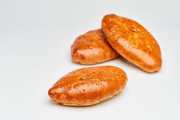 Golden-brown homemade pastries with a glossy crust, perfect for breakfast or a sweet snack