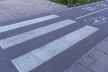 Fototapeta premium A crosswalk with a white line on it