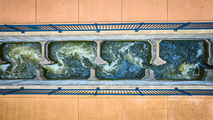 Aerial View of Water Management Facility with Turbulent Flow