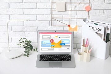 Fototapeta premium Received email messages on screen of laptop at workplace
