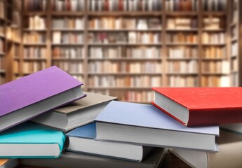 Set of reading books on table in library, education