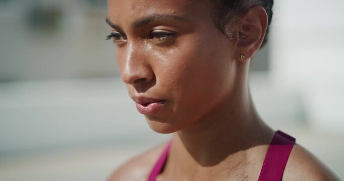 Woman, breathe or sweating with rest for fitness, exercise or workout outdoor for wellbeing. Athlete, wellness or person on break or exhausted for training, physical activity or working out in nature