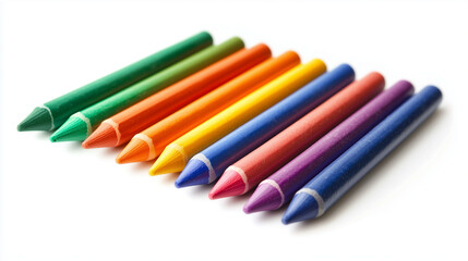 Fototapeta premium A vibrant set of colorful crayons arranged in a neat row against a white background, showcasing a spectrum of colors from green to violet.