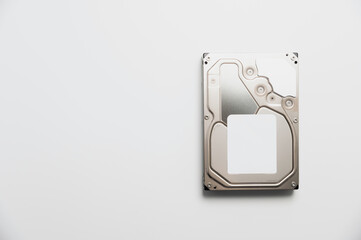 Disassembled interior of a hard drive, which is the computer's storage device. Broken hard drive on...