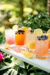 Fototapeta premium Colourful cocktails on an outdoor table