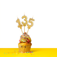 Birthday candle number 135 - Cupcake on white background
