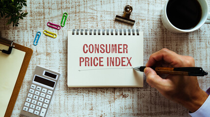 There is notebook with the word consumer price index. It is as an eye-catching image.
