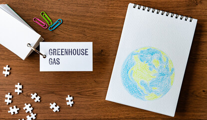 There is word card with the word Greenhouse Gas. It is as an eye-catching image.