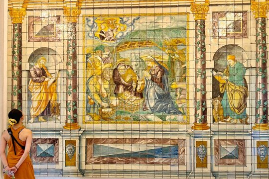 A tourist visiting National Tile Museum in Lisbon, Portugal