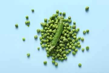 Green peas on blue background
