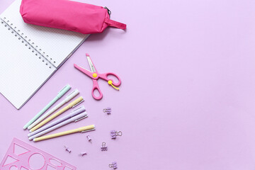 Composition with stationery and blank notebook on lilac background