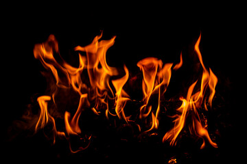 Fire flame background. Fire flames. Campfire texture. Flaming bonfire. Fire wallpaper. Bonfire background with copy space. Blaze fire flame texture background.