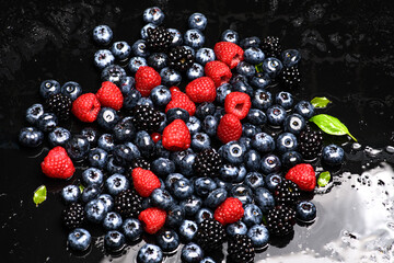 Raspberry, blueberry, blackberry. Blackberries, blueberries, raspberries. Berries background. Ripe juicy berries close-up. Fresh berries mix. Berry berries mix.