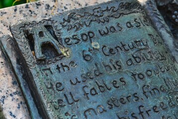 Weathered Bronze Plaque with Historical Inscription